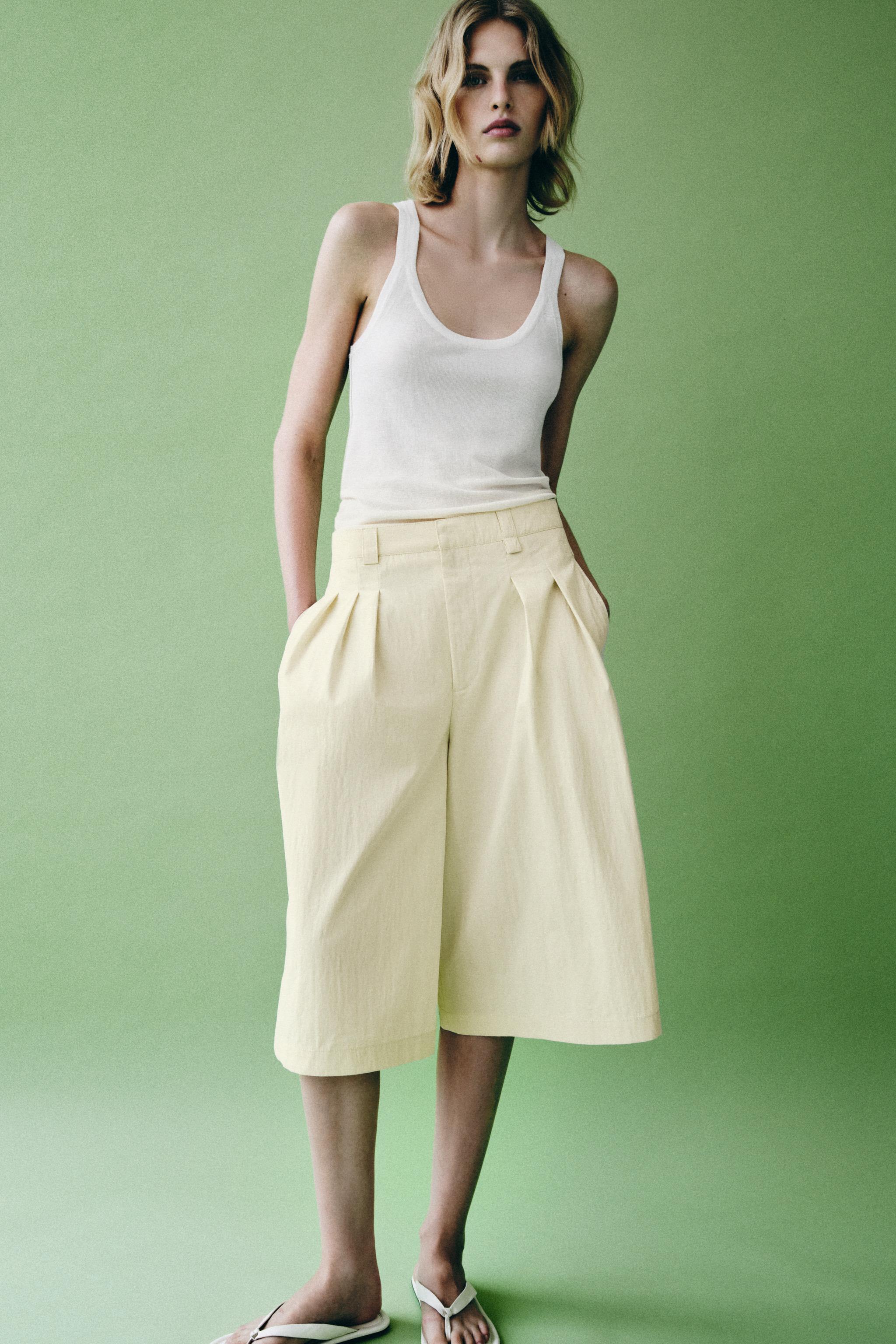 SANDALES PLATES EN CUIR